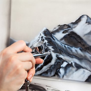 aérographie sur papier. aérographe par gravité